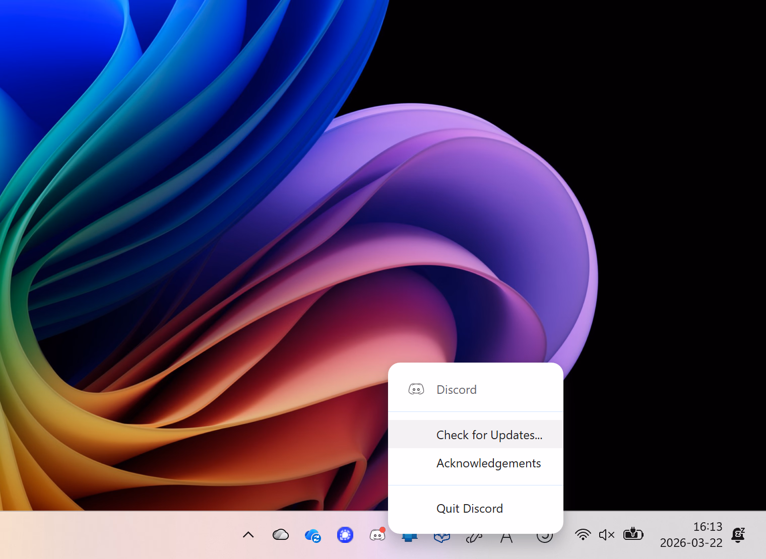 The tray icon context menu for Discord